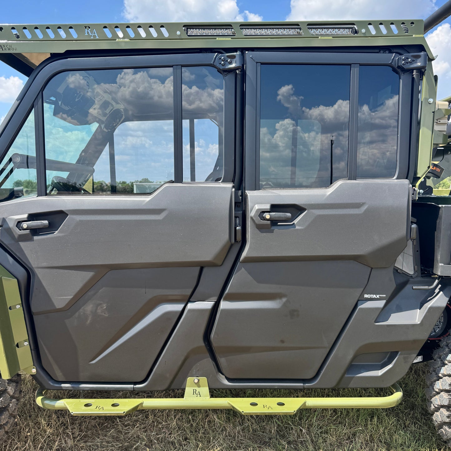 Side of Can-Am Defender G.I. Joe Top and Side Steps