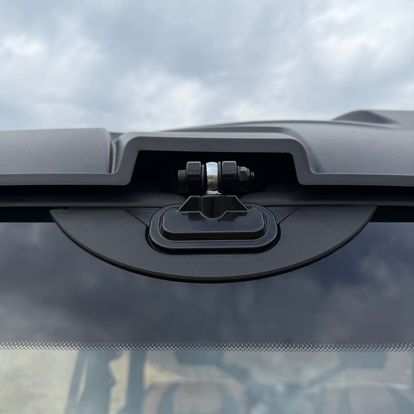 Aftermarket Can-Am tip-out glass windshield that fits like OEM, opens fully, includes vent mode, and seals better than factory.