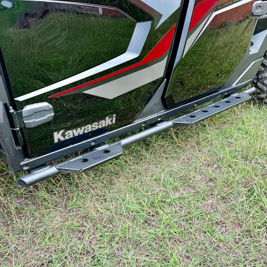 Black powder-coated side steps mounted on Kawasaki Ridge utility vehicle