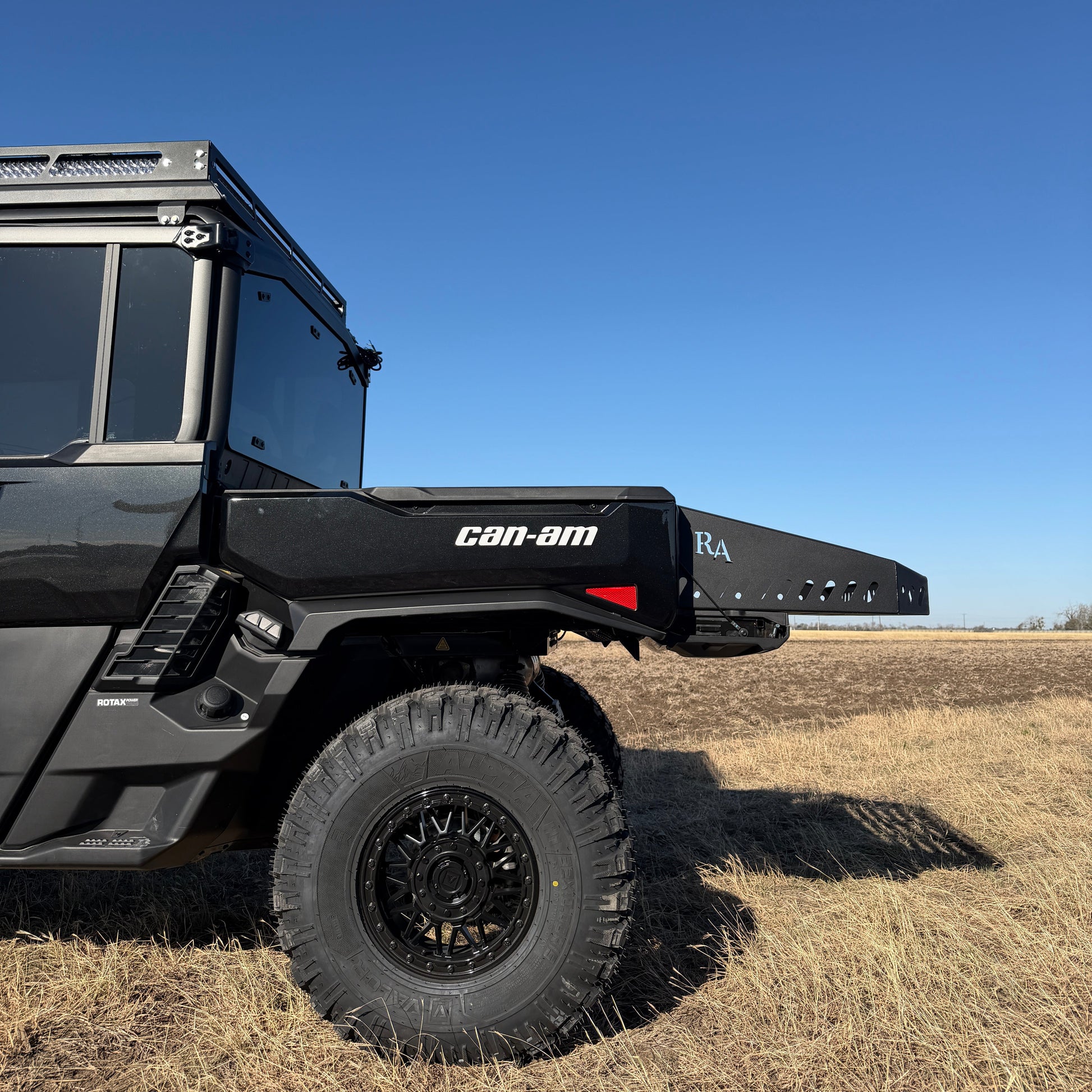 Can-Am Defender HD11 bed extension mounted on utility side-by-side truck bed