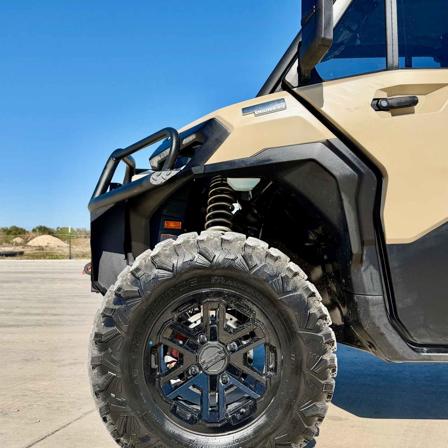 Can-Am Defender HD11 equipped with Ranch Armor steel front bumper for enhanced protection