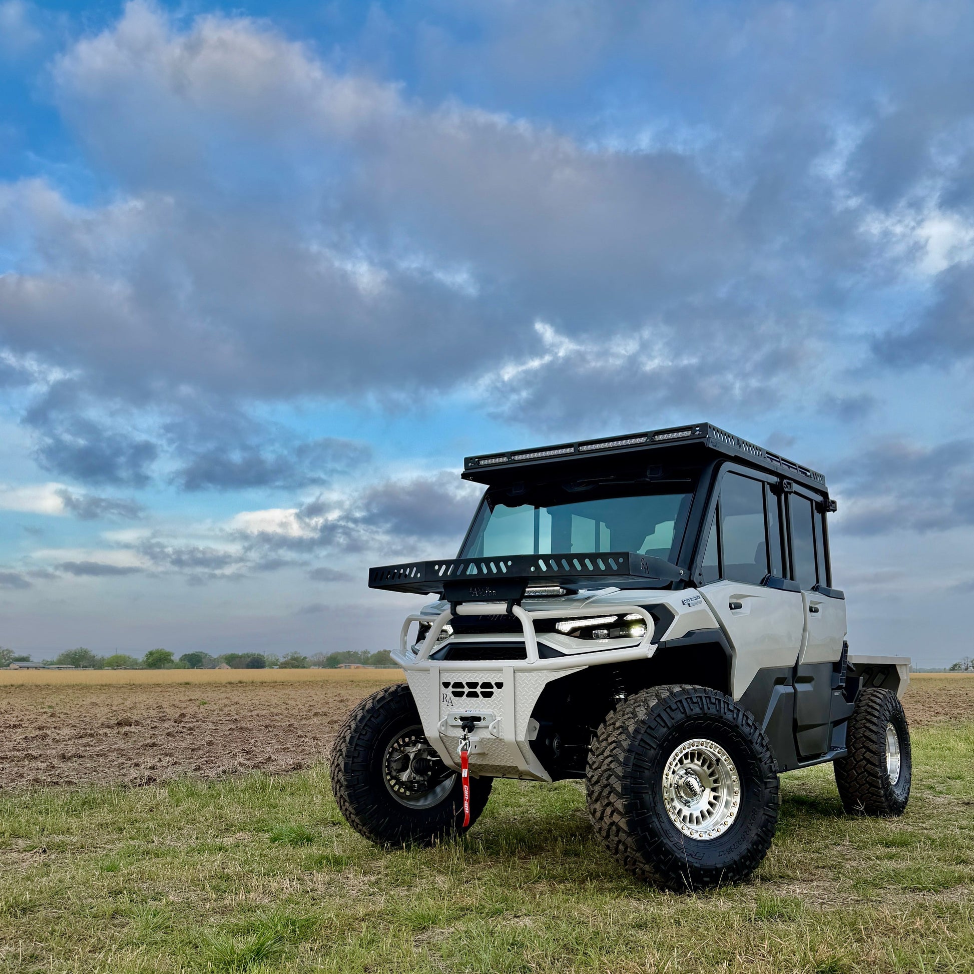 Can-Am Defender HD11 front bumper in hybrid white color match (2026+ model)