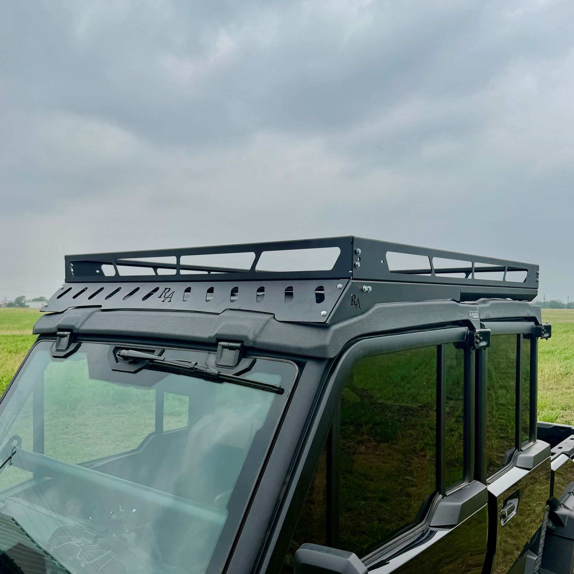 Can-Am Defender JL modular rack system with aluminum construction and cross slats for cargo