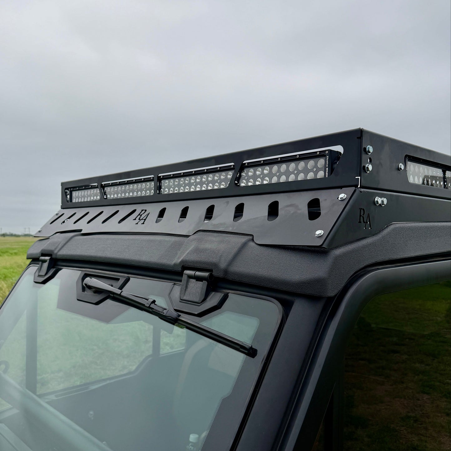 Can-Am Defender JL roof rack with integrated lighting options and rooftop storage capability