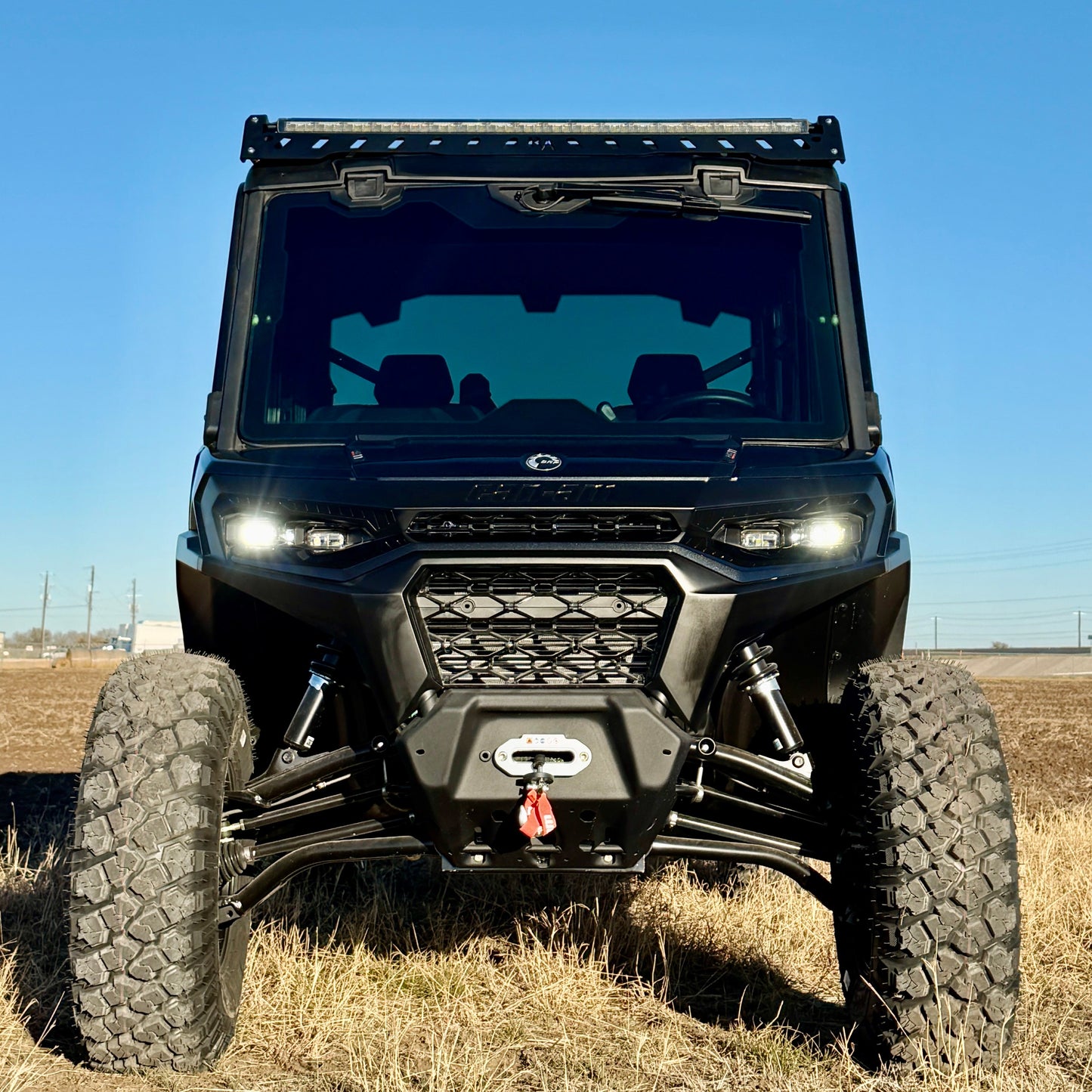 Can-Am Defender modular roof rack with LED light bar setup