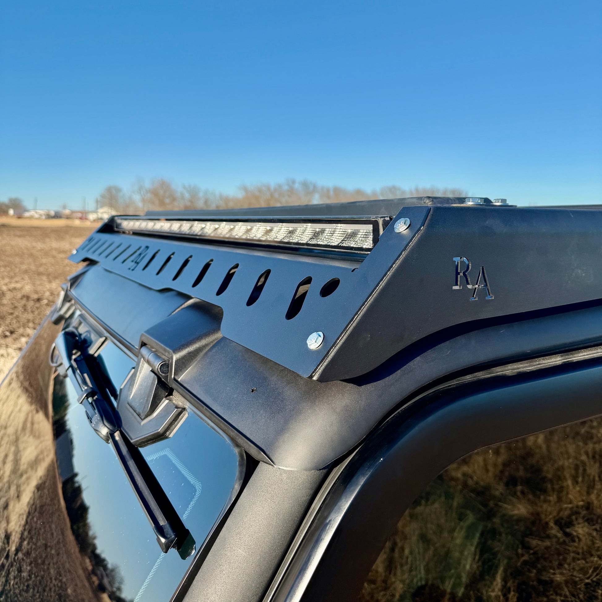 Can-Am Defender roof rack installed over factory plastic roof