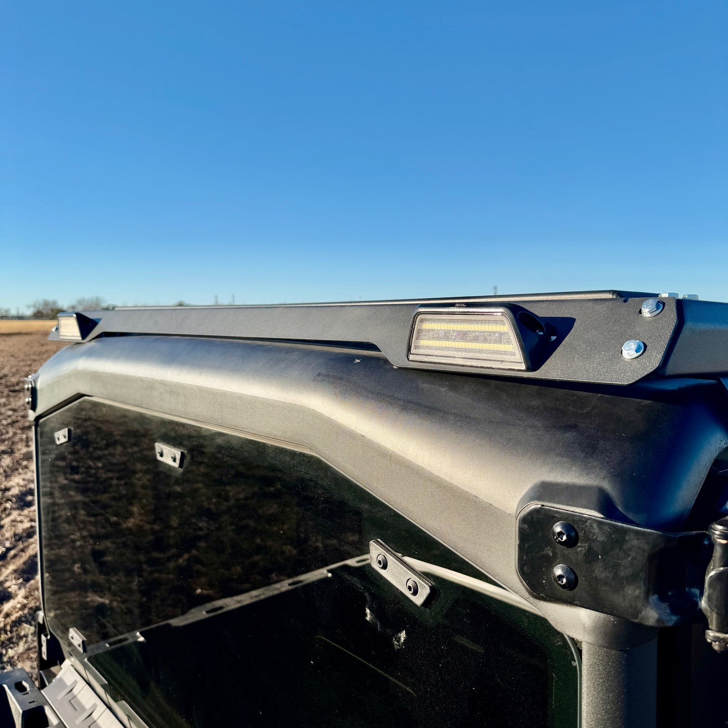 Can-Am Defender rooftop storage rack with lighting brackets