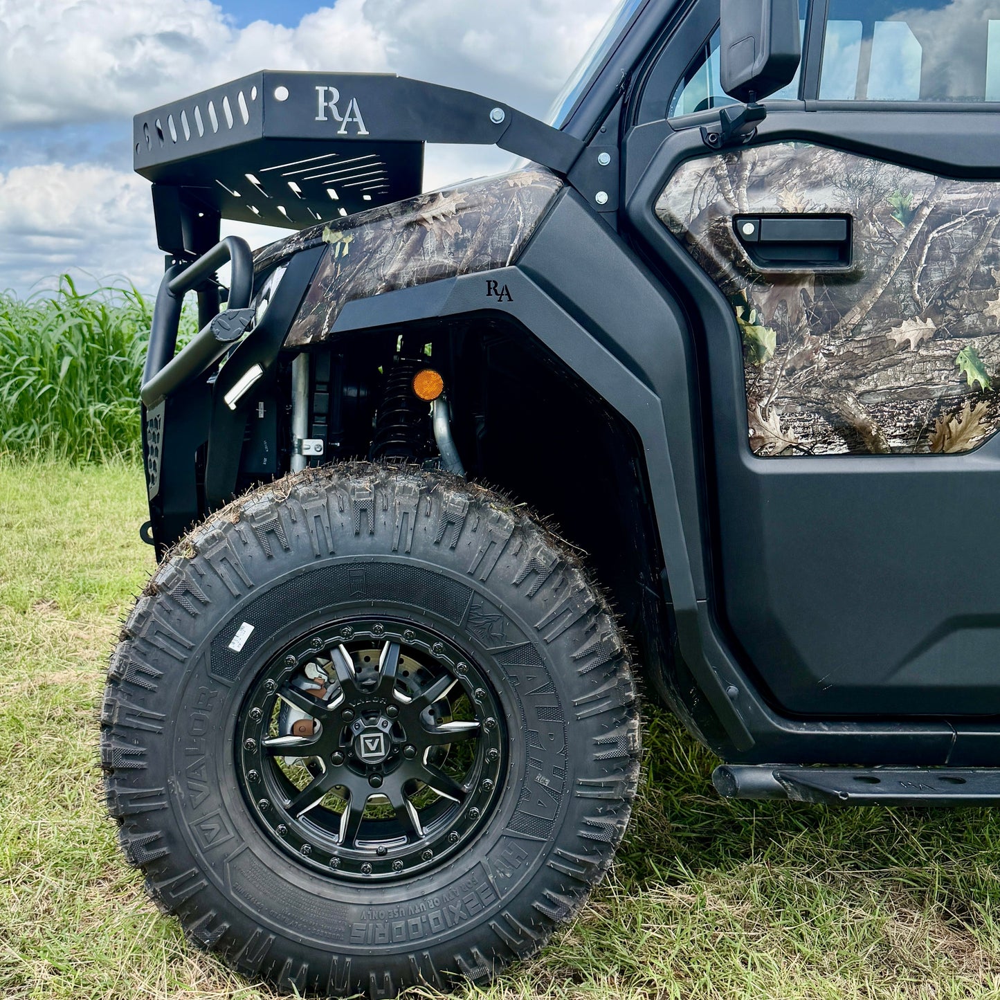 Close-up of CNC-formed aluminum fender flare mounted on a CFMoto U10 utility vehicle