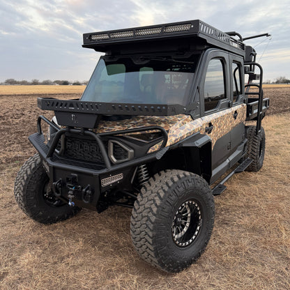 Close-up of custom wheels and off-road tires on Polaris Ranger 1500 Project Kudu build