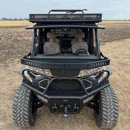 Custom Polaris Ranger 1500 Project Kudu build combining utility flatbed, camo wrap, and premium interior
