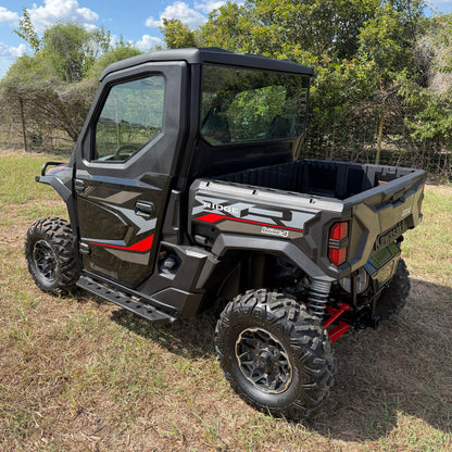 Driver-side rock slider on a Kawasaki Ridge Single Cab