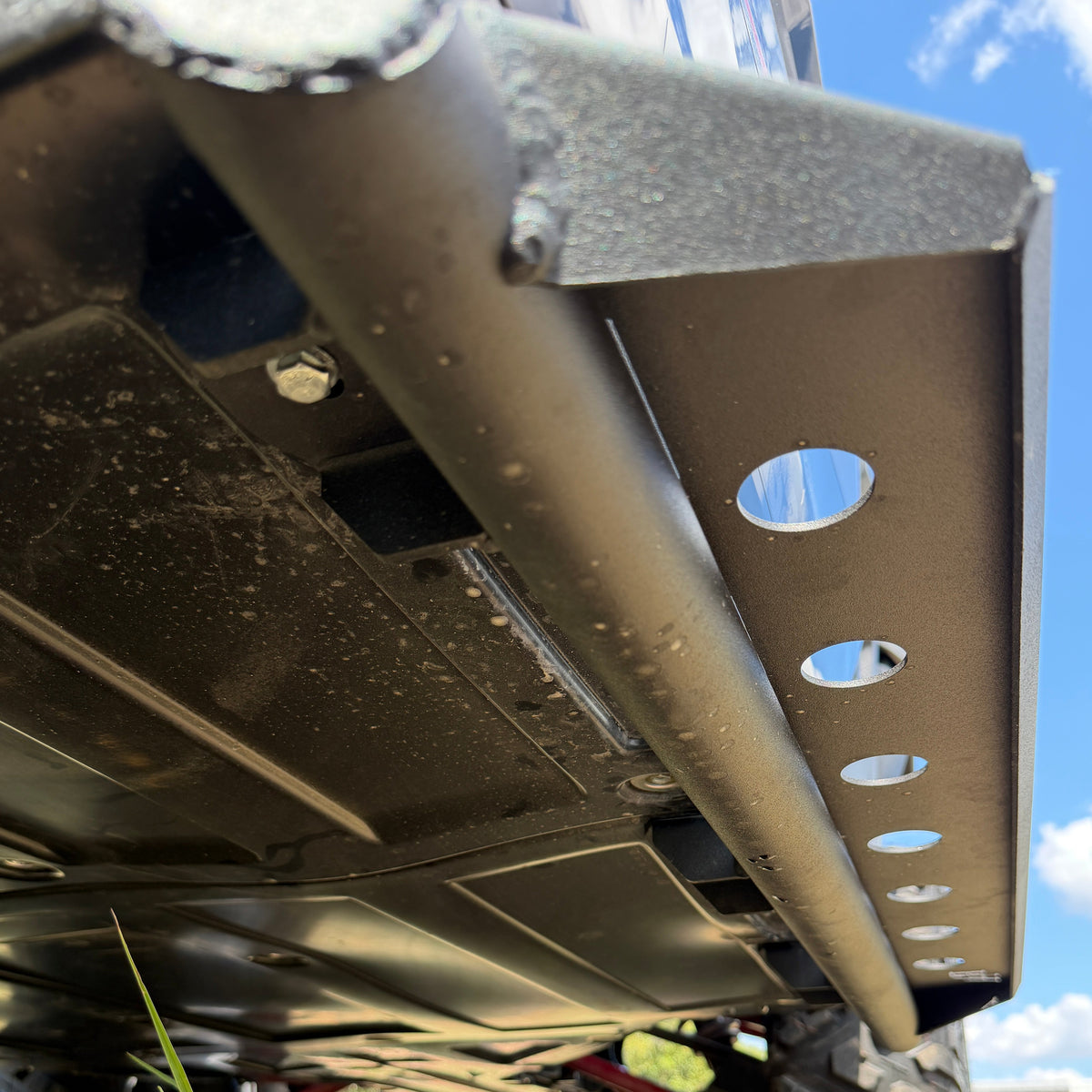 Grip holes in a Kawasaki Ridge side step plate