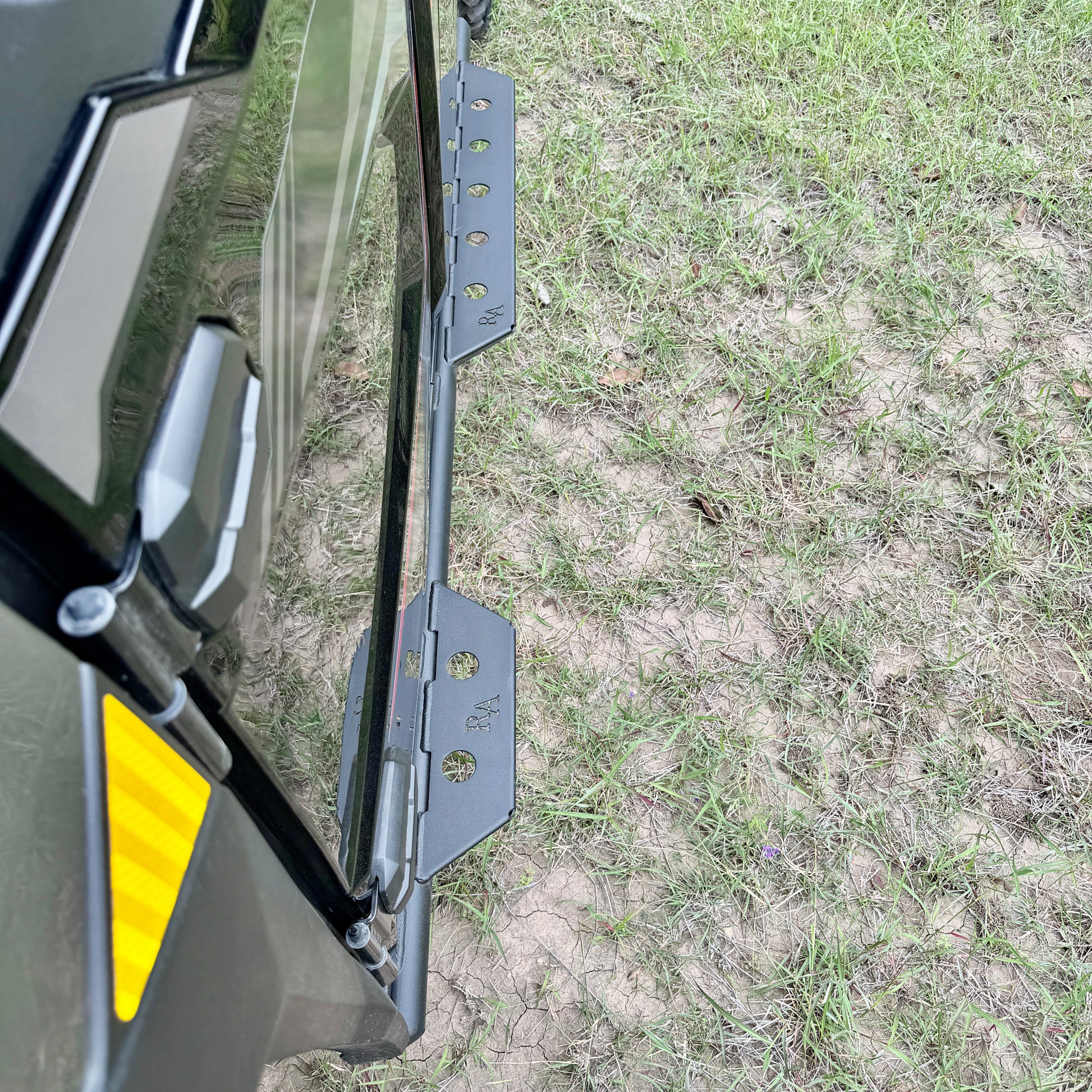 Heavy-duty Kawasaki Ridge nerf bars for side protection and easy entry