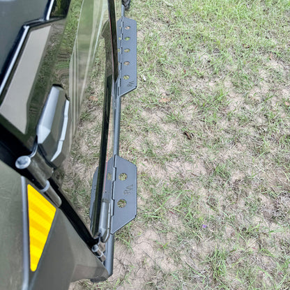 Heavy-duty Kawasaki Ridge nerf bars for side protection and easy entry