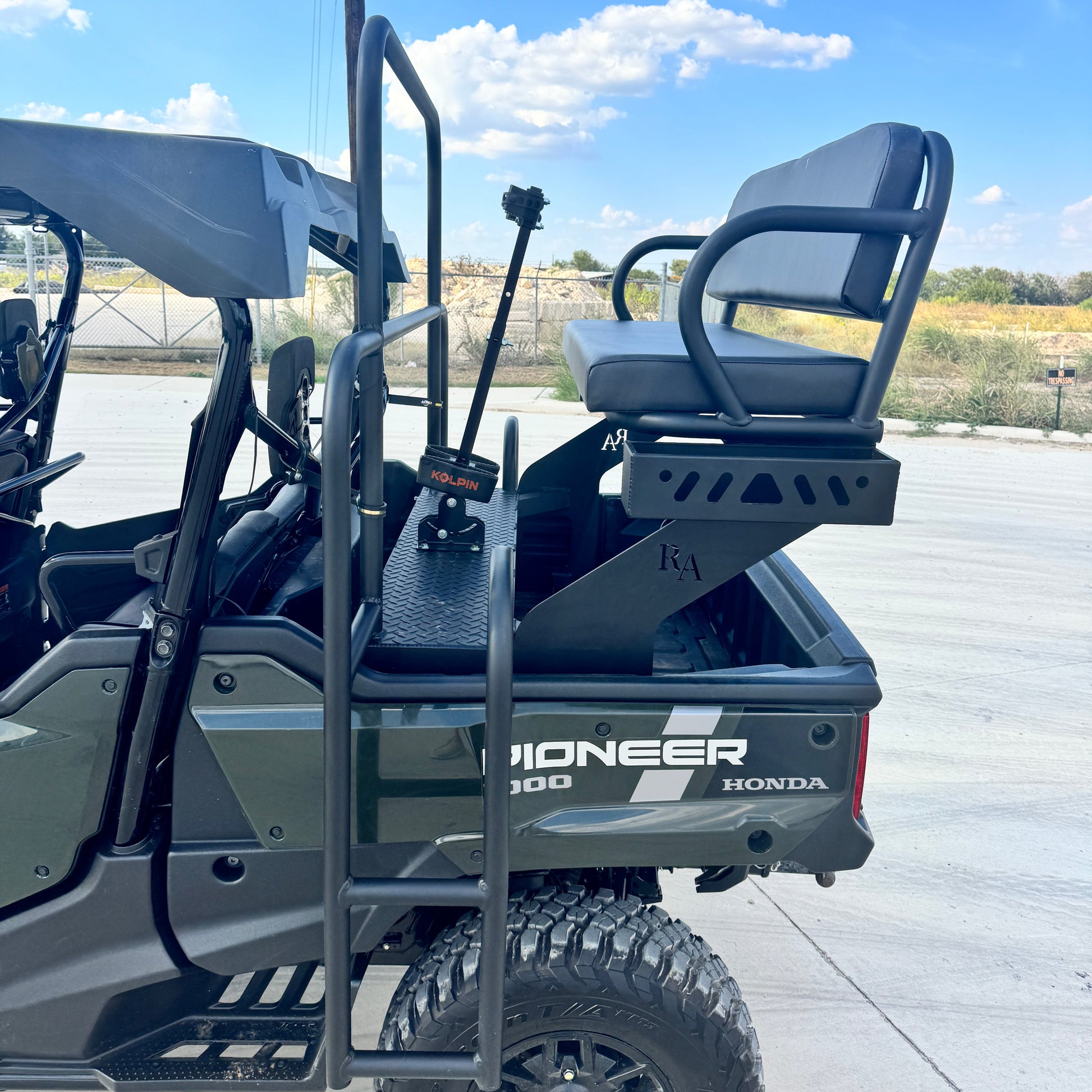 Honda Pioneer featuring elevated rear high seat for extra riders and improved view