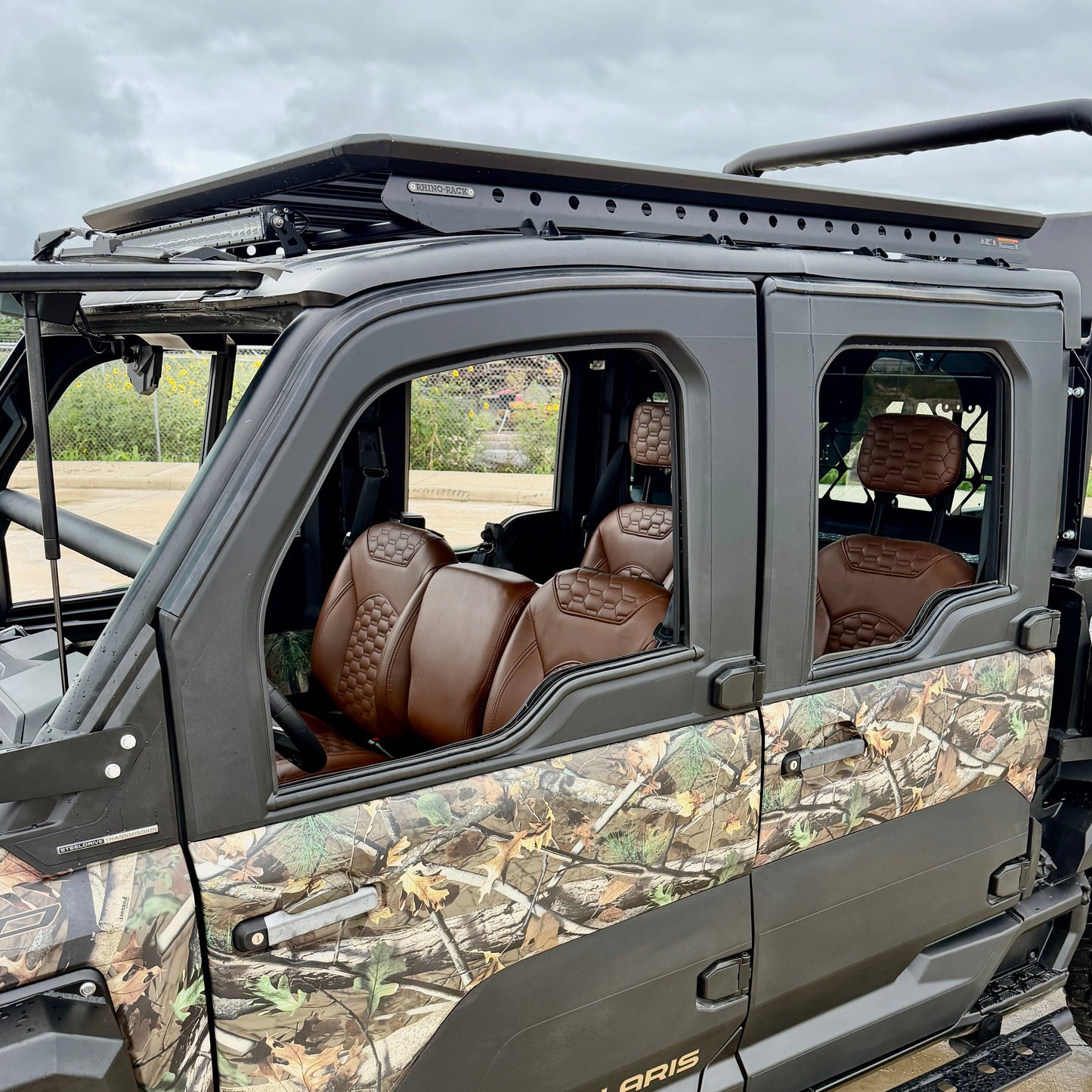 Level 3 custom leather interior for Polaris Ranger XD 1500 Crew featuring genuine leather and diamond cross stitching.