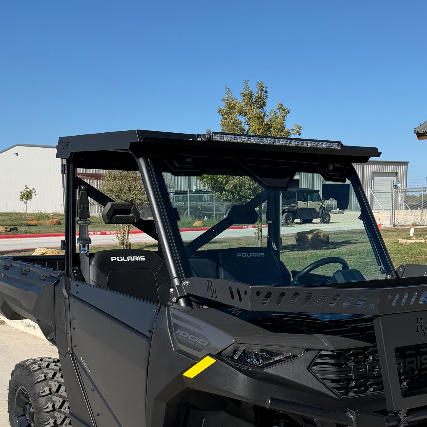 Polaris Ranger 1000 single cab with heavy-duty Ranch Armor metal roof installed