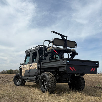 Polaris Ranger 1500 Project Kudu with custom wheels and aggressive off-road tires in rugged terrain