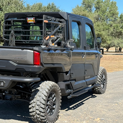 Polaris Ranger 1500 featuring reinforced steel side step nerf bars for off-road durability