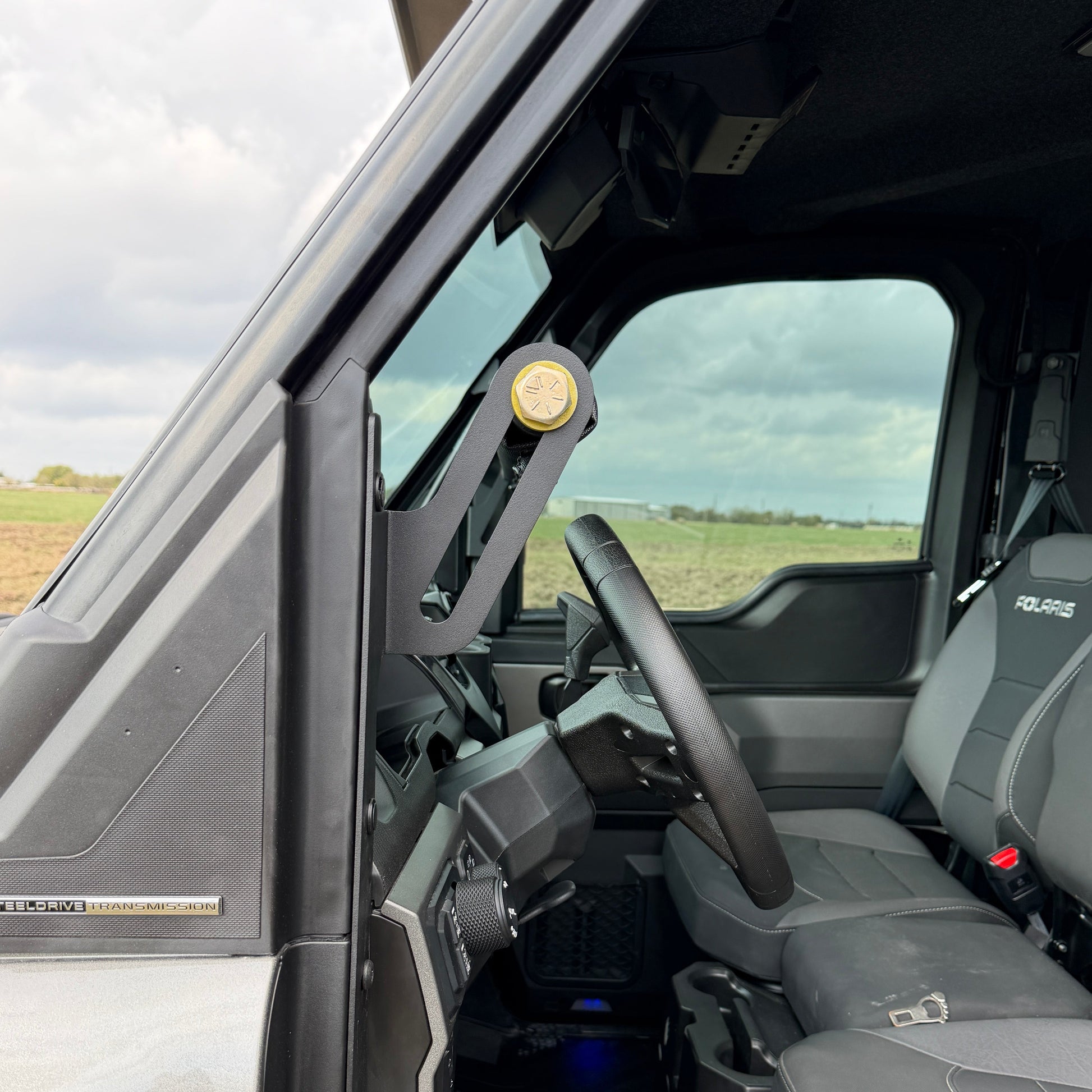 Polaris Ranger 1500 interior rifle rack by Ranch Armor providing safe and accessible gun transport.