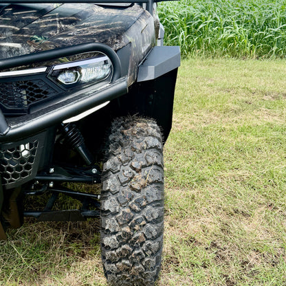Powder-coated CFMoto U10 fender flares protecting against rocks, mud, and trail debris