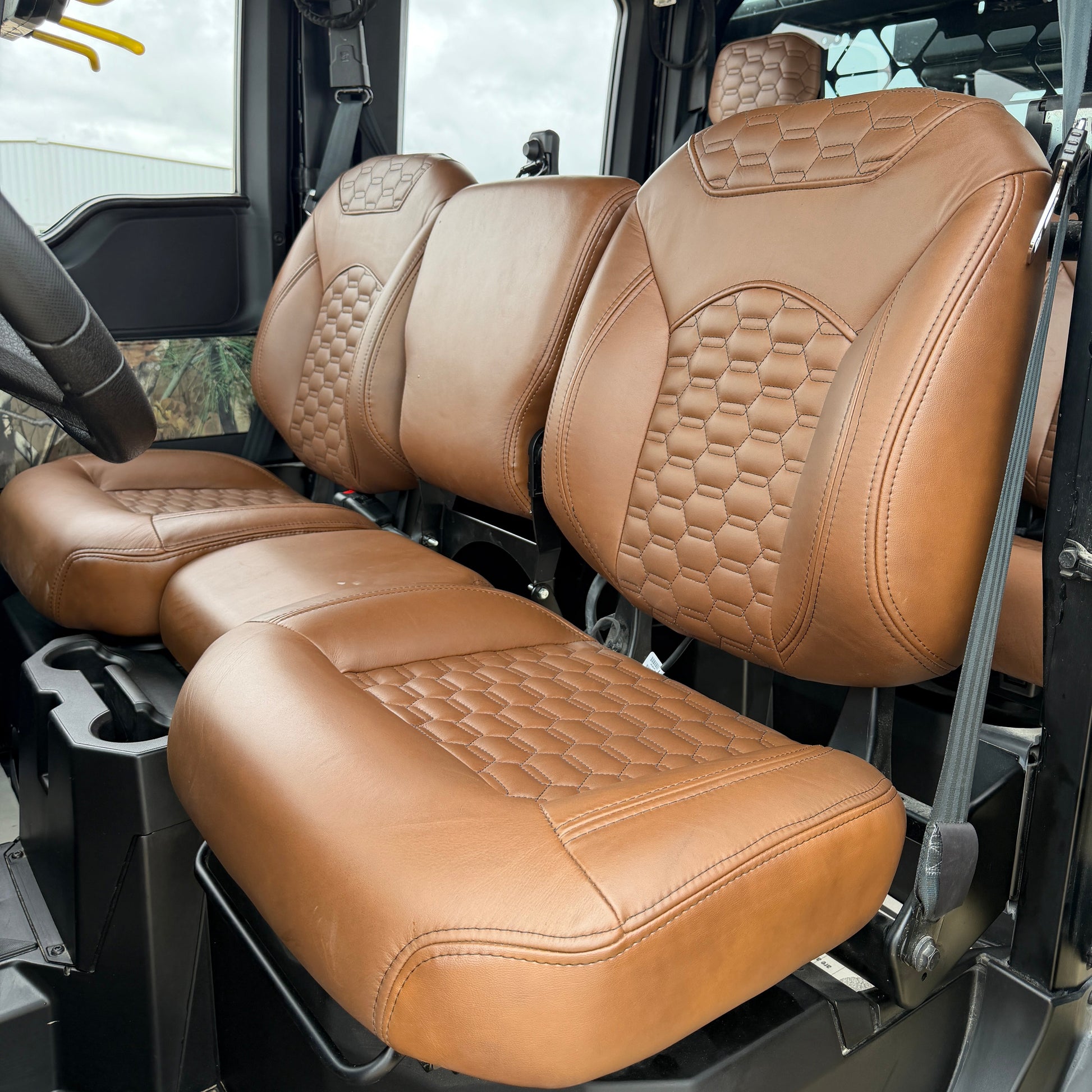 Premium Texas-made Polaris Ranger XD 1500 Crew leather seats with custom stitching and enhanced comfort bolsters.