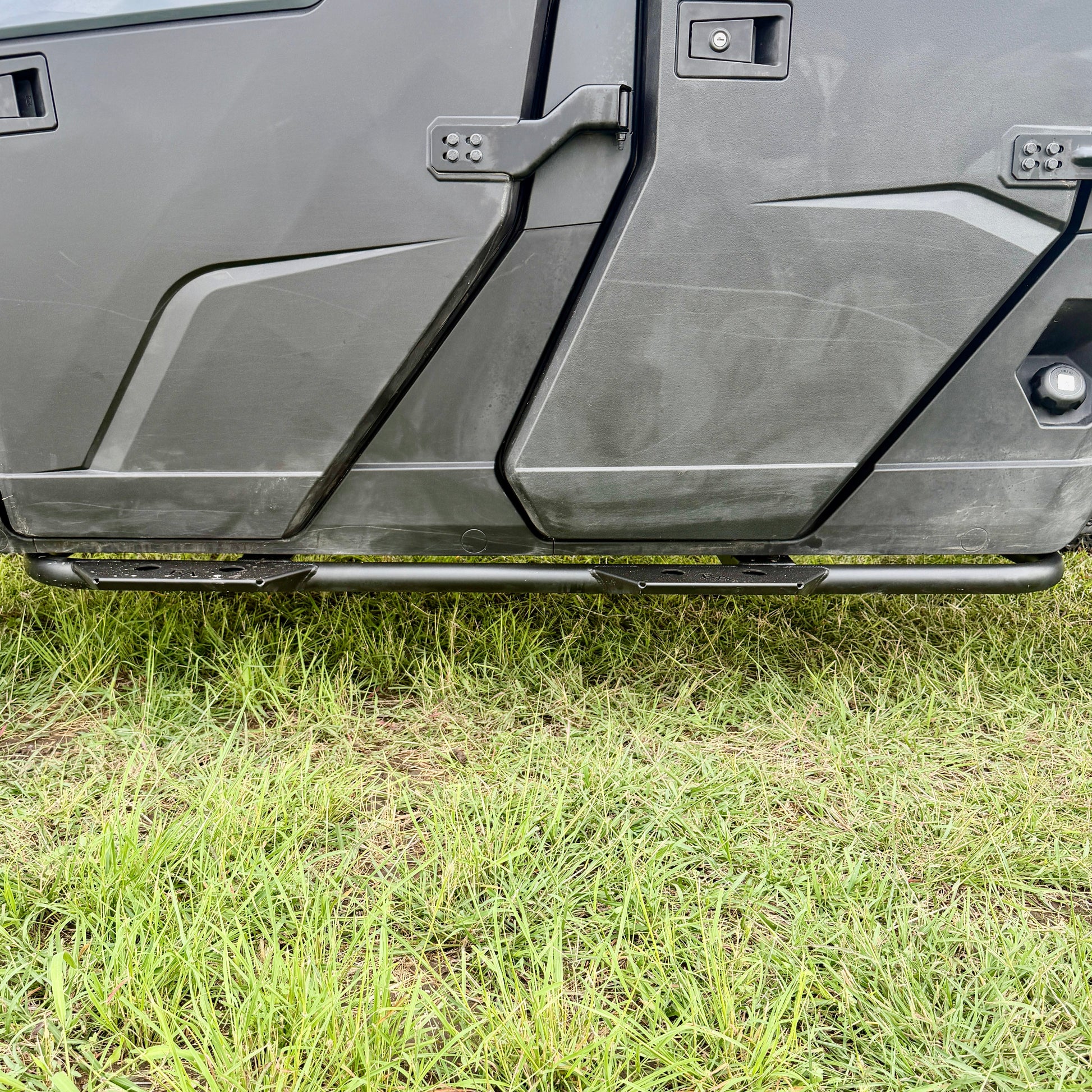 Ranch Armor Polaris Ranger 1000 side steps installed on UTV with heavy-duty steel construction