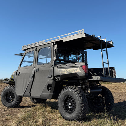 Ranch Armor aluminum top installed on Polaris Ranger 1000, extended design shading the bed