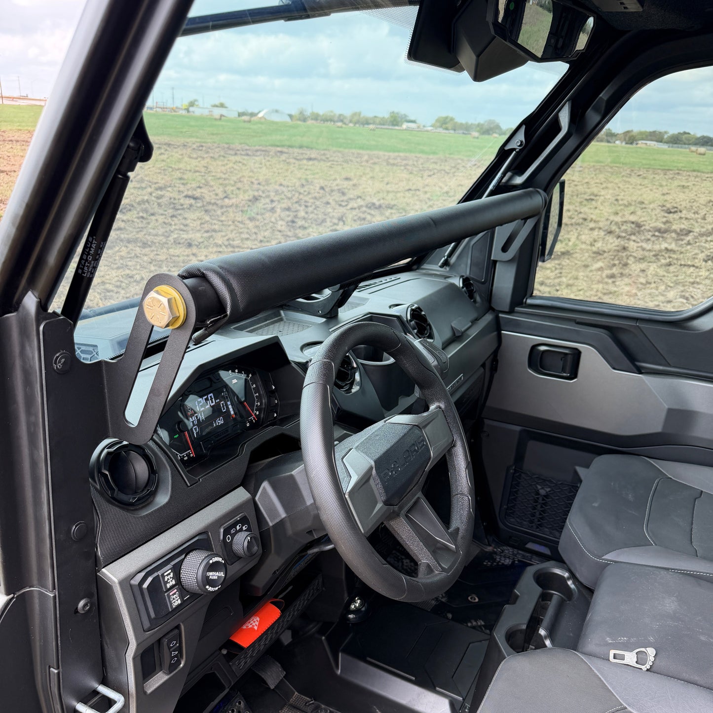 Ranch Armor interior rifle mount installed inside Polaris Ranger 1500 for secure firearm storage.