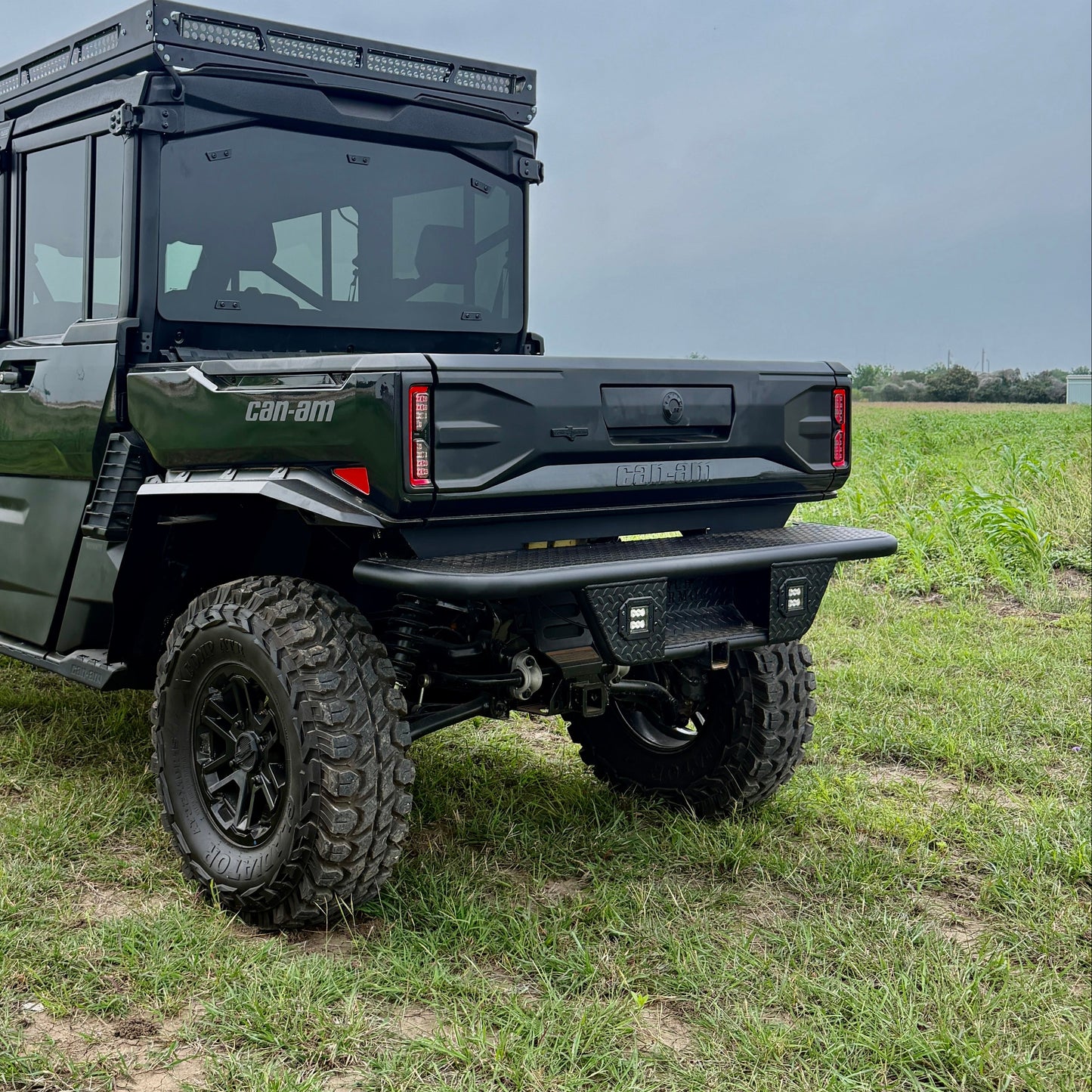 Ranch Armor rear bumper installed on a Can-Am Defender HD11 UTV for enhanced durability, towing capability, and off-road defense.