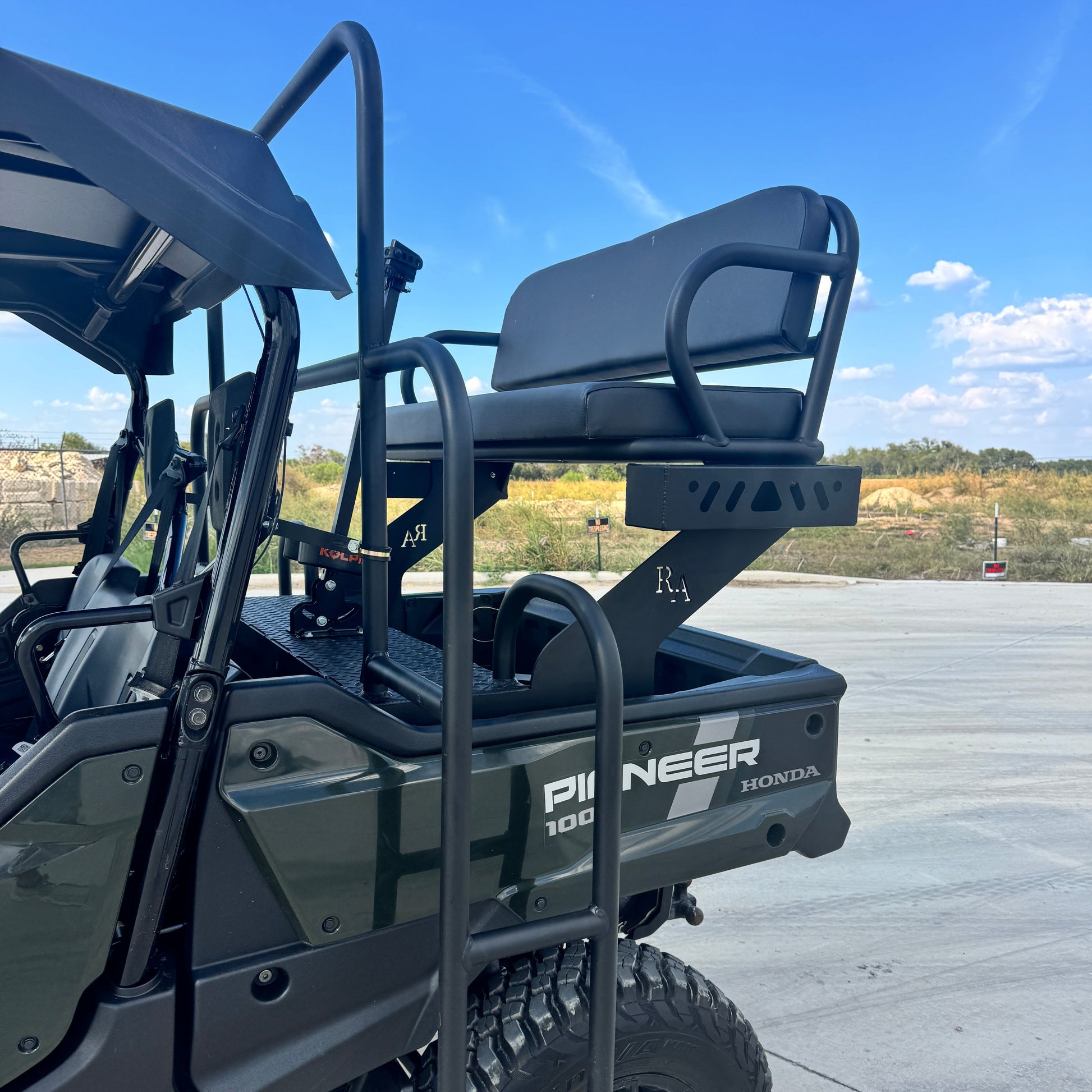 Rear high seat installed on Honda Pioneer UTV for elevated visibility and comfort