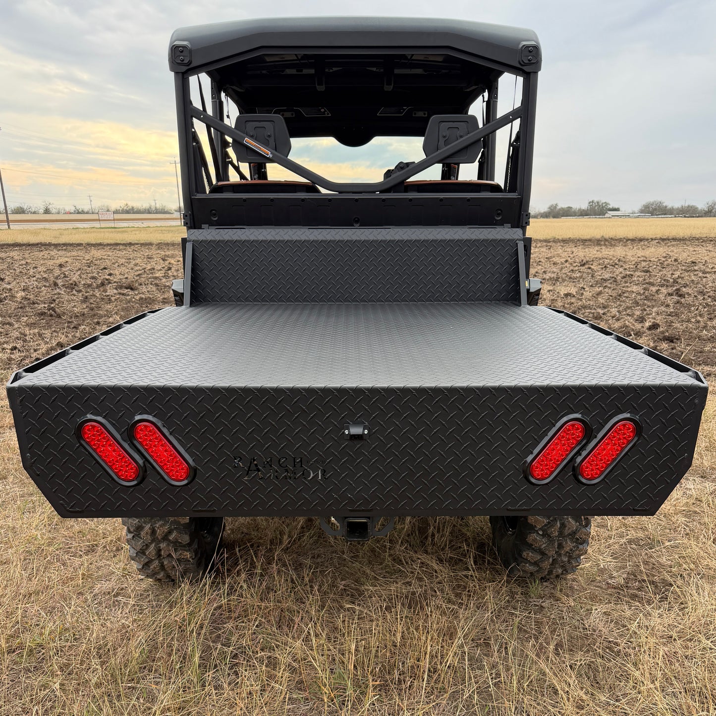 Can-Am Defender HD11 equipped with Ranch Armor aluminum flatbed