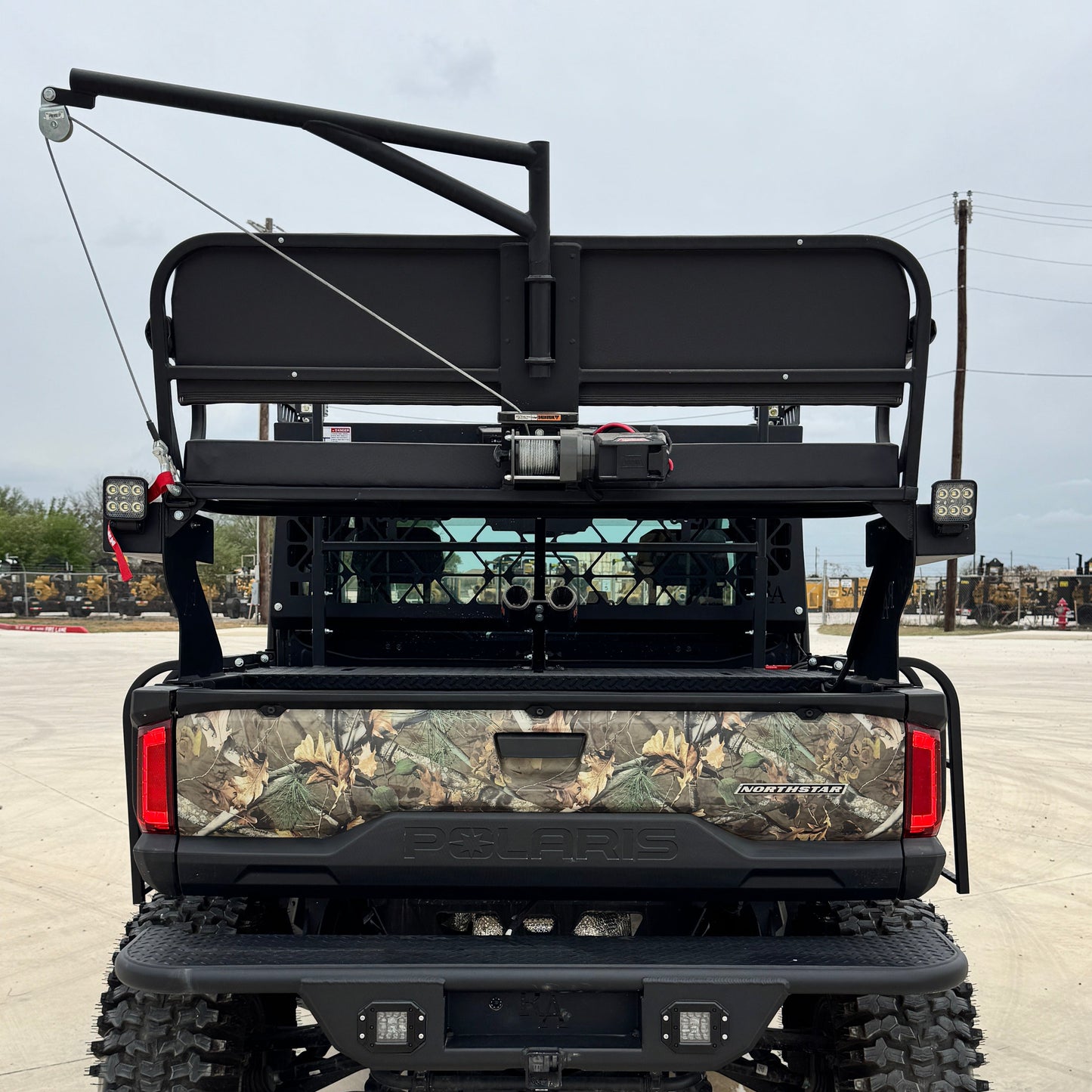 Rear view of Polaris Ranger 1500 with hoist and rear bumper