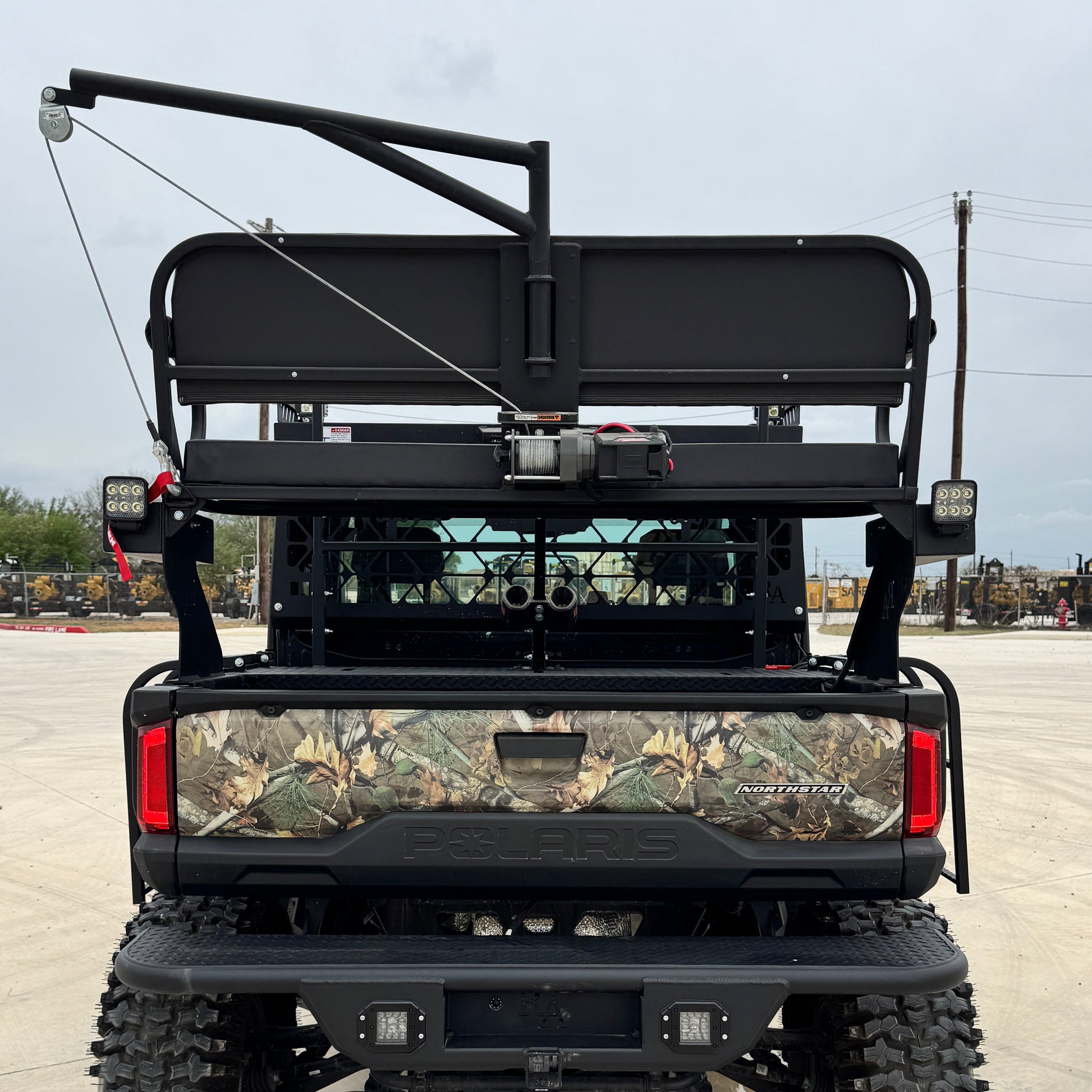 Rear view of Polaris Ranger 1500 with hoist and rear bumper