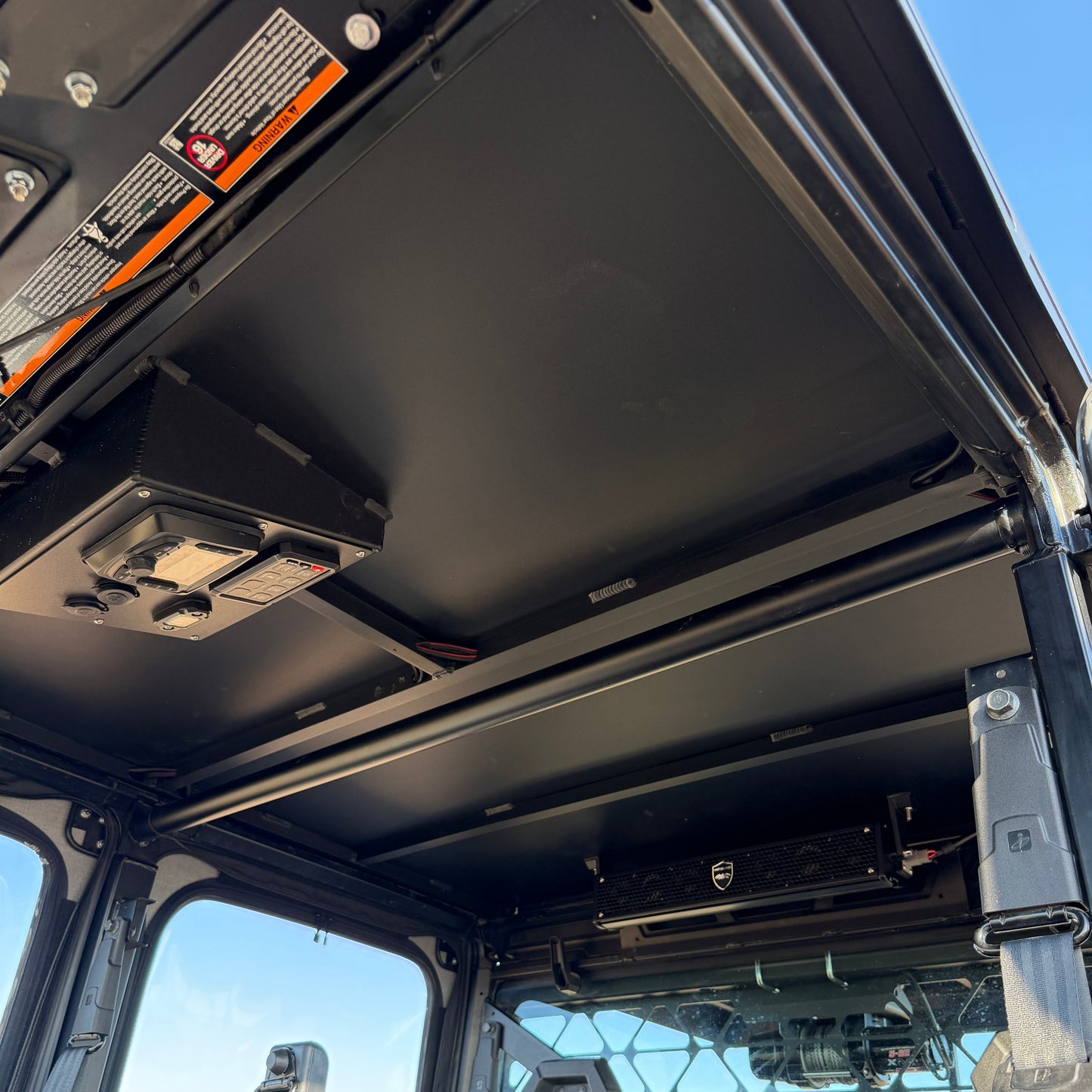Side-by-side view of Polaris Ranger 1000 with Ranch Armor extended aluminum roof