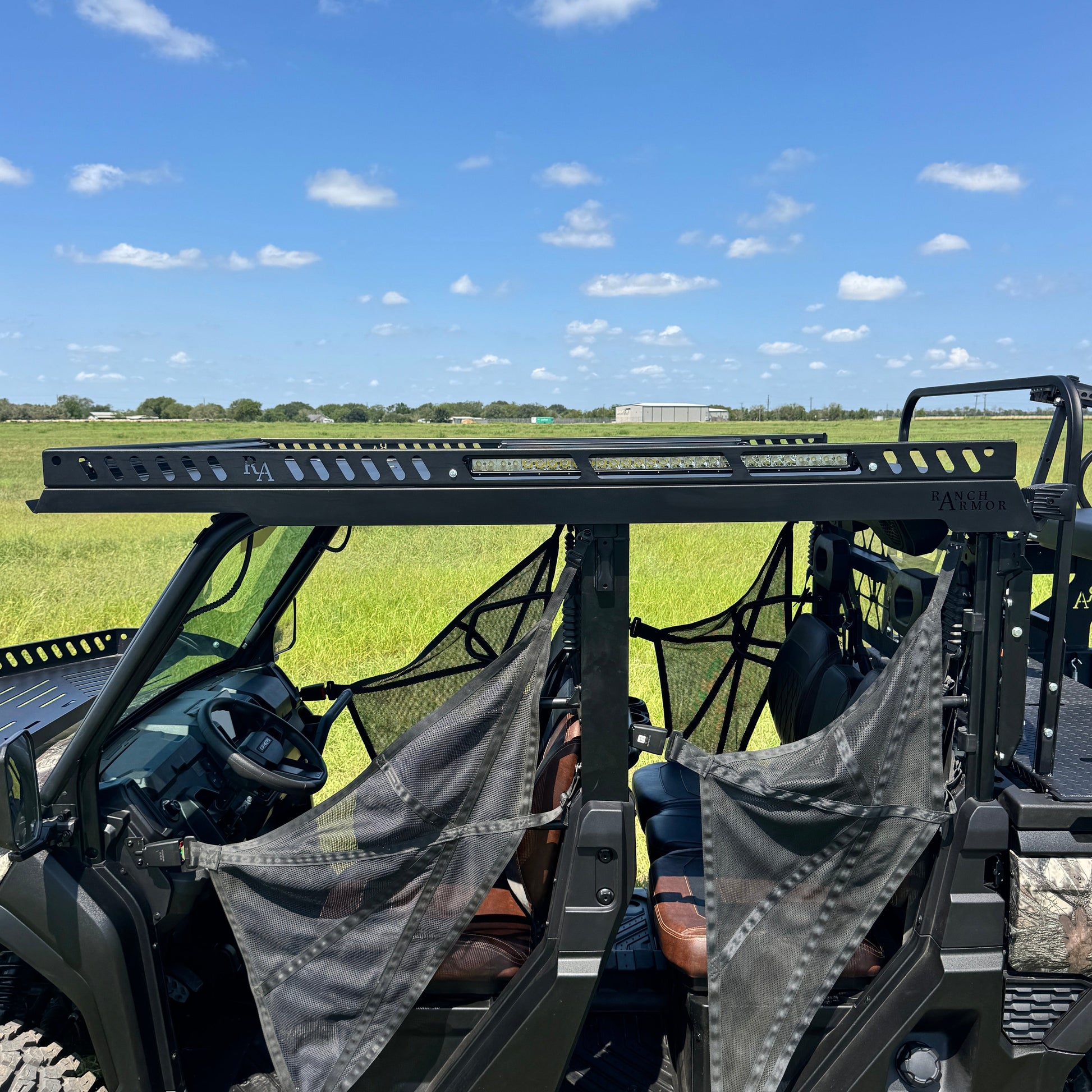 Side view of CFMoto U10 Pro equipped with durable powder-coated Ranch Armor metal top